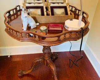 Chippendale style mahogany tea table with Rosenthal wire hair terrier porcelain figure