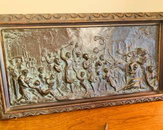 bronze wall plaque depicting a Bacchanalian scene
