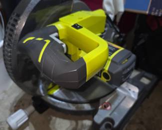 The item shown is a Ryobi 10-inch Compound Miter Saw, likely model TS1346. Type: Compound Miter Saw Power Source: 14 Amp Corded Blade Diameter: 10 inches Key Features: Designed for making angled cuts on boards.