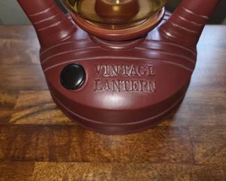 Vintage Direct CL2395S 26-inch lantern table lamp featuring a rustic red finish and a burlap shade.