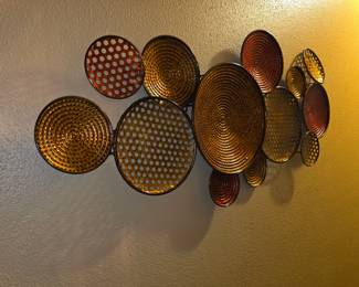 StyleCraft Nobu Circle Metal Wall Art, featuring a design of copper and bronze circles.