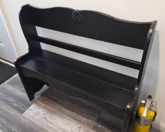This item appears to be a rustic black country-style storage bench, similar in design to a deacon bench or farmhouse entryway bench.