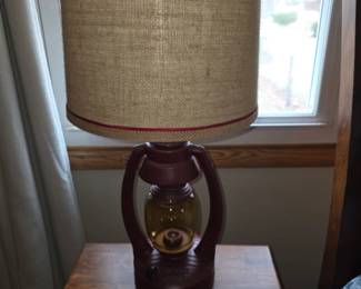 Vintage Direct CL2395S 26-inch lantern table lamp featuring a rustic red finish and a burlap shade.