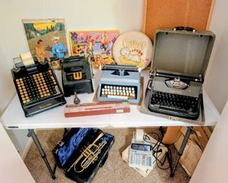Antique and vintage type writers and adding machines