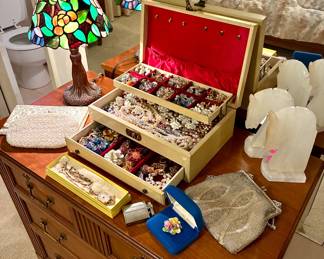 Costume jewelry will be moved near the gold table in the middle of the house