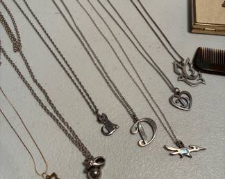 Several Sterling James Avery pieces