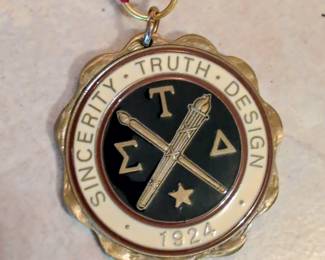 Sigma Tau Delta enameled medallion