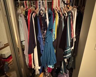 Vintage clothing men's and women's multiple closets throughout the home