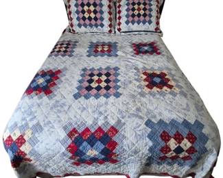 Faux Leather Headboard and Quilted Bedding