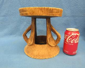 Lot 235. Hand-carved wooden display stand brought back from Africa by the consigner