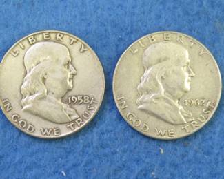 Lot 108. Two Silver Franklin Half Dollars