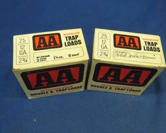 Lot 216. Two vintage AA shotgun shell boxes. Each box contains 25 AA 8-shot and 9-shot shotgun shells. These shells may be reloads. AS-IS. Use at your own risk.