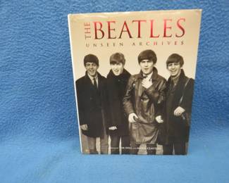 Lot 231. 384 page Beatles book "Unseen Archives"