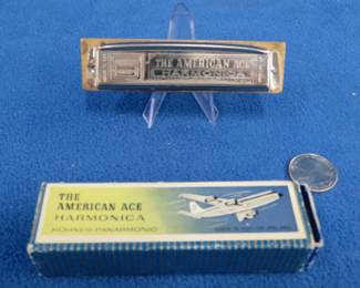 Lot 172. Vintage Hohner-Panarmonic The American Ace 10-hole diatonic harmonica in the key of G and box all in excellent condition