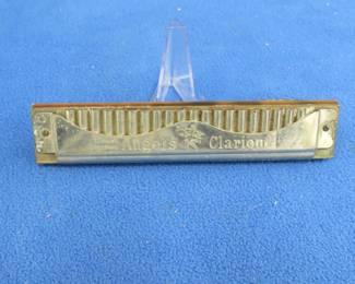 Lot 135. Weiss's Angel's Clarion 40-hole tremolo harmonica in the key of E. Some holes sound bad.