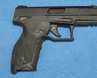Lot 13. Taurus TX22 .22 caliber semi-auto pistol. S/N 1PT0378555. Never been shot. Includes two magazines, manual, and original box.
