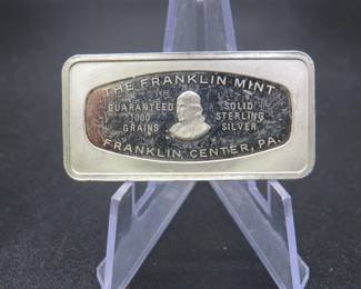 Lot 48. 1978 Franklin Mint sterling silver Waiting for Santa 2.323-ounce ingot