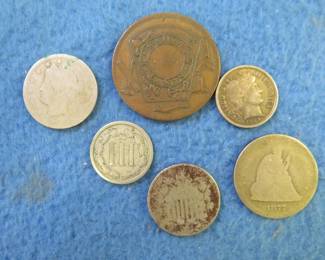 Lot 202. Six old coins: 1866 Masonic Penny from John's Chapter Minneapolis. 1865 Silver Three-Cent Piece. Shield Nickel No date. Liberty Head Nickel No date. 1899 P Silver Barber Dime. 1877 Silver Liberty Seated Quarter.