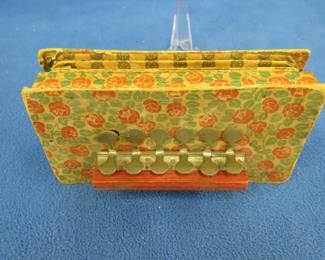 Lot 75. Antique toy accordion. Fragile but produces sound
