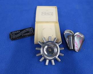 Lot 30. Three vintage Pitch Pipes: Gutz metal wheel in the box. Chromatische Stimmpfeife in a metal box with papers. Durro International Pitch standard.