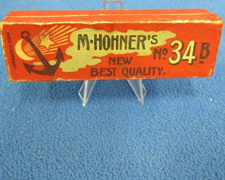Lot 176. Vintage M. Hohner New Best Quality No. 34B 10-hole diatonic harmonica in the key of G in the box in VGC