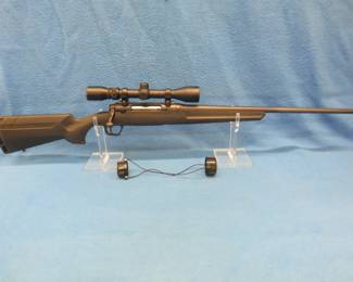 Lot 20. Savage Axis 6.5 Creedmoor bolt-action rifle. S/N N807699. Never been fired. Includes Weaver 3-9x40 scope, original box, and manual.