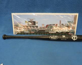 Lot 26. 2003 Shannon Stewart souvenir wooden bat and a picture of Target Field