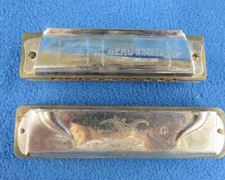 Lot 31. Two vintage harmonicas: Hero 10-hole diatonic harmonica. Sounds great. Valencia 10-hole diatonic harmonica in the key of G. Sounds great.