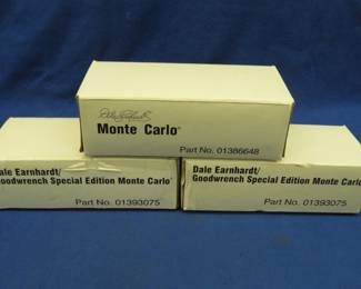 Lot 265. Three 1:24 Revell diecast cars: One Dale Earnhard Monte Carlo Part No. 01386648. Two Dale Earnhard Special Edition Monte Carlo Part. No. 01393075