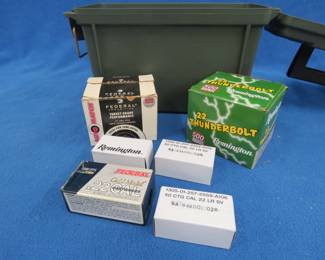 Lot 227. Hundreds of 22 LR rounds in a plastic ammo box: One box of 500 Remington 22 Thunderbolt rounds. One open box of approx. 150 Federal .22 LR rounds.. Three boxes of 50 each Remington .22LR SV rounds. One box of 50 Federal Gold Medal .22 LR rounds.