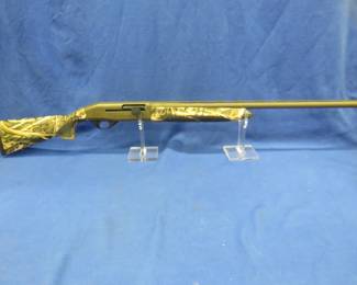 Lot 303. Weatherby Ducks Unlimited Element 12-gauge semi-auto shotgun. S/N RL014201. Won at a banquet and never fired. Includes choke set and gun lock.