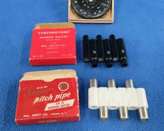 Lot 74. Three vintage Pitch Pipes: Wm. Kratt Co. "Synchrotone". Wm. Kratt Co. new Super Pitch Pipe. Master Key Chromatic Pitch Instrument.
