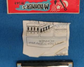 Lot 138. Hohner Old Standby 34B 10-hole diatonic harmonica in the key of C with box and papers. Sounds perfect. All are in like-new condition.