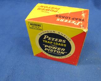 Lot 215. One vintage Peters Trap Load box in VGC. The box contains 25 9-shot shotgun shells in AA hulls which may be reloads. AS-IS. Use at your own risk.