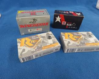 Lot 225. Four boxes of 12-gauge rifled slugs: Two boxes of 5 each Rio Ammunition 2 3/4" slugs. One box of 15 Winchester slugs. One box of 10 Stars and Stripes slugs.