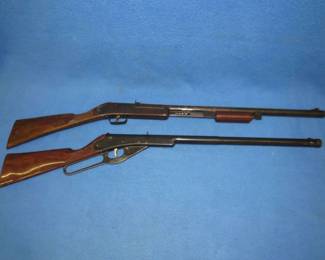 Lot 16. Daisy Model 107 pump BB gun with good compression for parts or repair. Missing barrel insert. Daisy Model 155 lever-action BB gun that needs new seals.