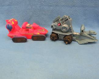 Lot 120. Two Masters of the Universe vehicles. A 1981 Battle Ram and a working 1982 Attack Trak, missing the battery cover.