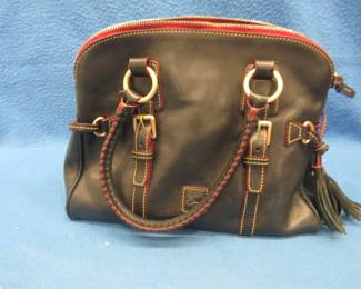 Lot 316. Dooney & Bourke purse in VGC with a dust cover
