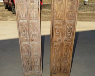 Lot 295. Two Polynesian themed carved wooden storage cabinets. 41" tall