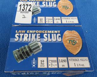 Lot 223. Two boxes of 10 each NSI Law Enforcement Strike Slugs shotgun shells