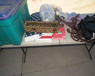 Lot 293. Misc. household items including bolts of USA flag materiel plus a tote