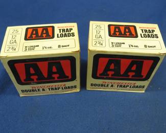 Lot 212. Two boxes of 25 each AA 8-shot shotgun shells. These shells may be reloads. AS-IS. Use at your own risk.