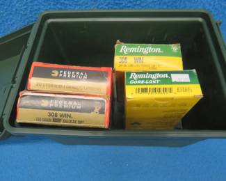 Lot 19. Shell box with 70 total rounds of 308 Win. 34 Federal and 36 Remington