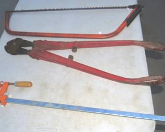 Lot 291. Bar clamp, bow saw, and a bolt cutter