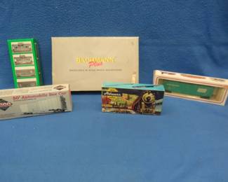 Lot 274. Five train cars in their original boxes