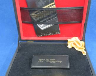 Lot 78. 2007 Hohner 150th Anniversary Gold Edition 10-hole diatonic harmonica with a glass comb and stainless cover plate. Only 150 made and this is is #34. Included in this lot are a beautiful presentation case, a harmonica case, a pamphlet for the 150th Anniversary, and a letter from the Deutsches Harmonica Museum to the purchaser. Minimum bid $40.