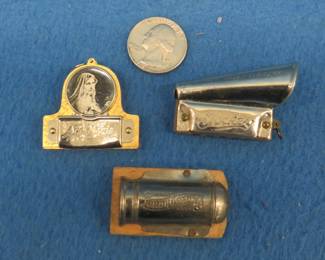 Lot 171. Three working vintage miniature harmonicas: "The Little Jockey" 5-hole harmonica with a resonator made in Germany. "Princes Ave Maria" 4-hole neckless harmonica likely made in Japan. "Autophone" 3-hole advertising harmonica for a department store