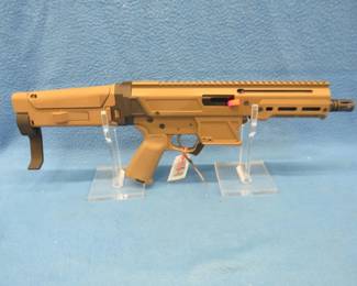 Lot 23. Palmetto Jakl-V 9mm semi-auto pistol with extendable stock. S/N JK9000378. Never been fired. Includes one magazine, original box, and scannable manual. Minumum bid $800.