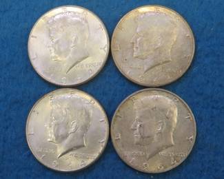 Lot 141. Four Kennedy Half Dollars: two 1964 P and two 1964 D