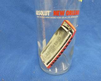 Lot 77. Absolut New Orleans vodka bottle with graphics from The Original L.O. Smith trio